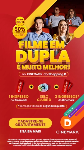 Casal sorridente no cinema, com pipoca - Shopping D